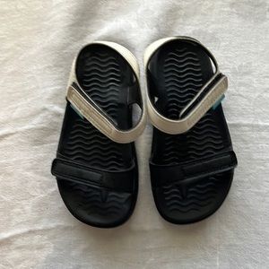 **SOLD Like new, black and white, Native sandals size 10c